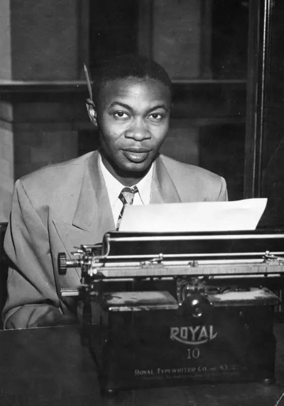 1950s Suffolk Journal staffer at typewriter - celebrating our alumni legacy of student engagement and campus involvement